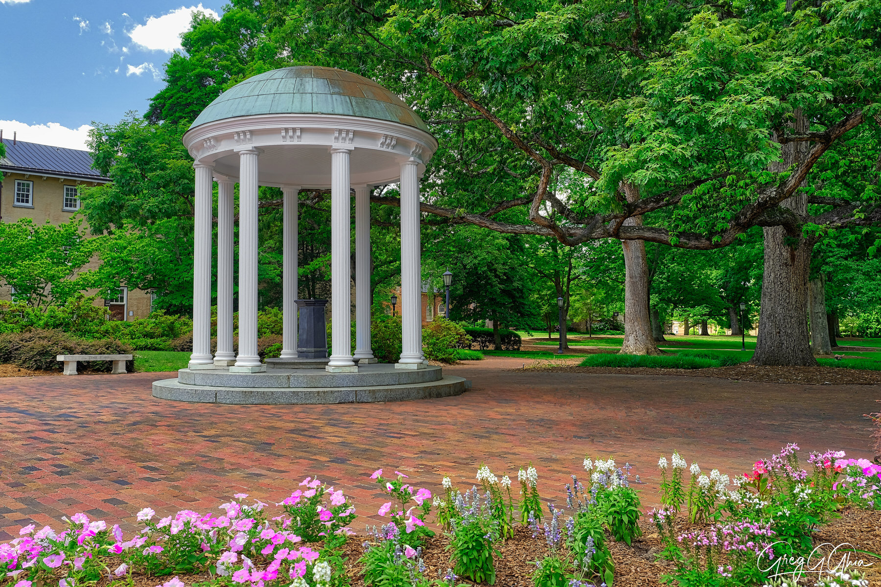 Beautfiul summer day in Chapel Hill, NC. The old well under Carolina blue skies. A symbol of excellence since 1894.